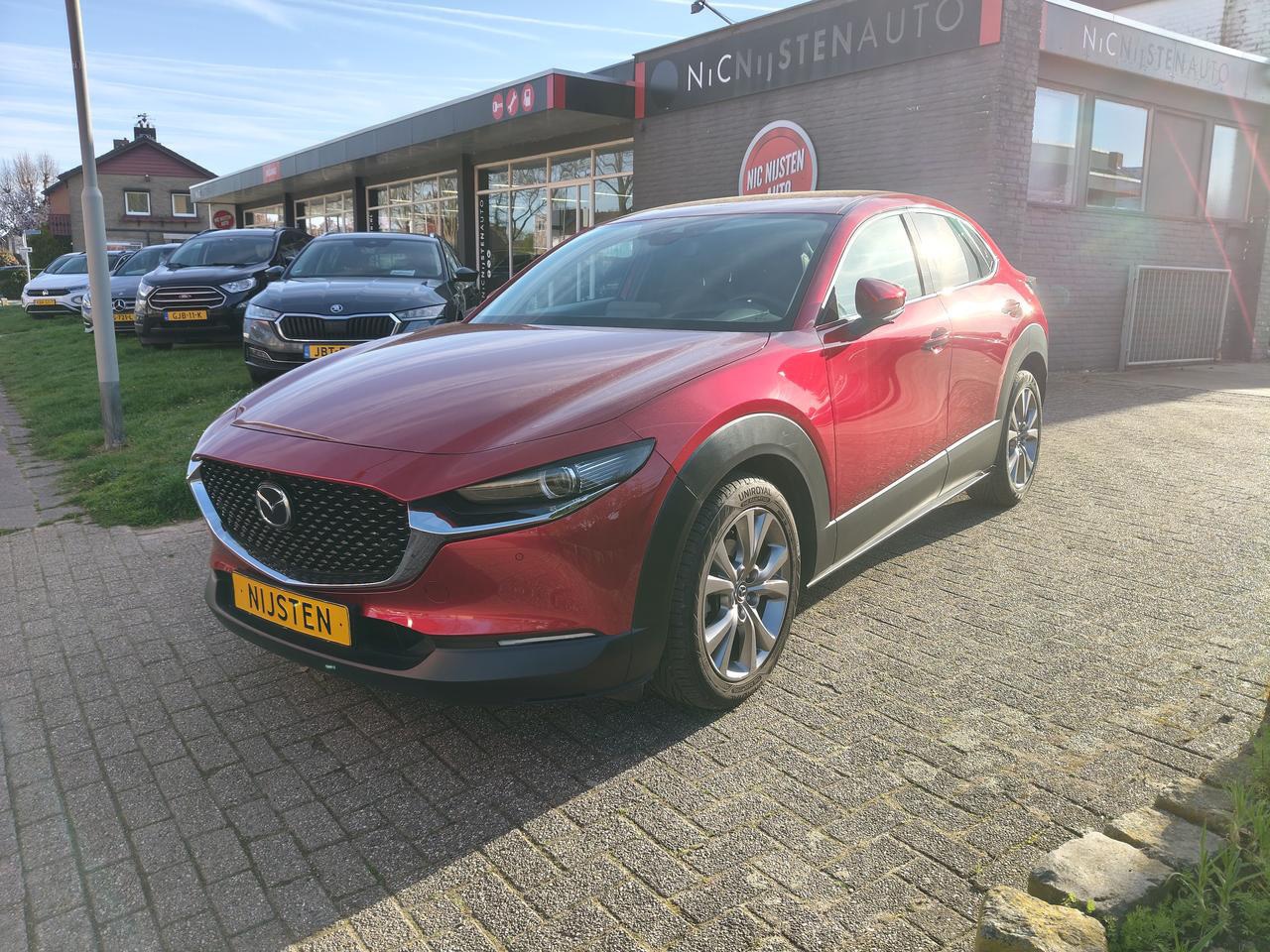 Mazda CX-30 - 2.0 e-SkyActiv-G M Hybrid Comfort, Leer. - AutoWereld.nl