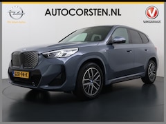 BMW iX1 - eDrive20 67kWh M Sport pakket Pano-Dak/Schuif-dak Leer SOH 100% Warmtepomp Camera Navi Ecc
