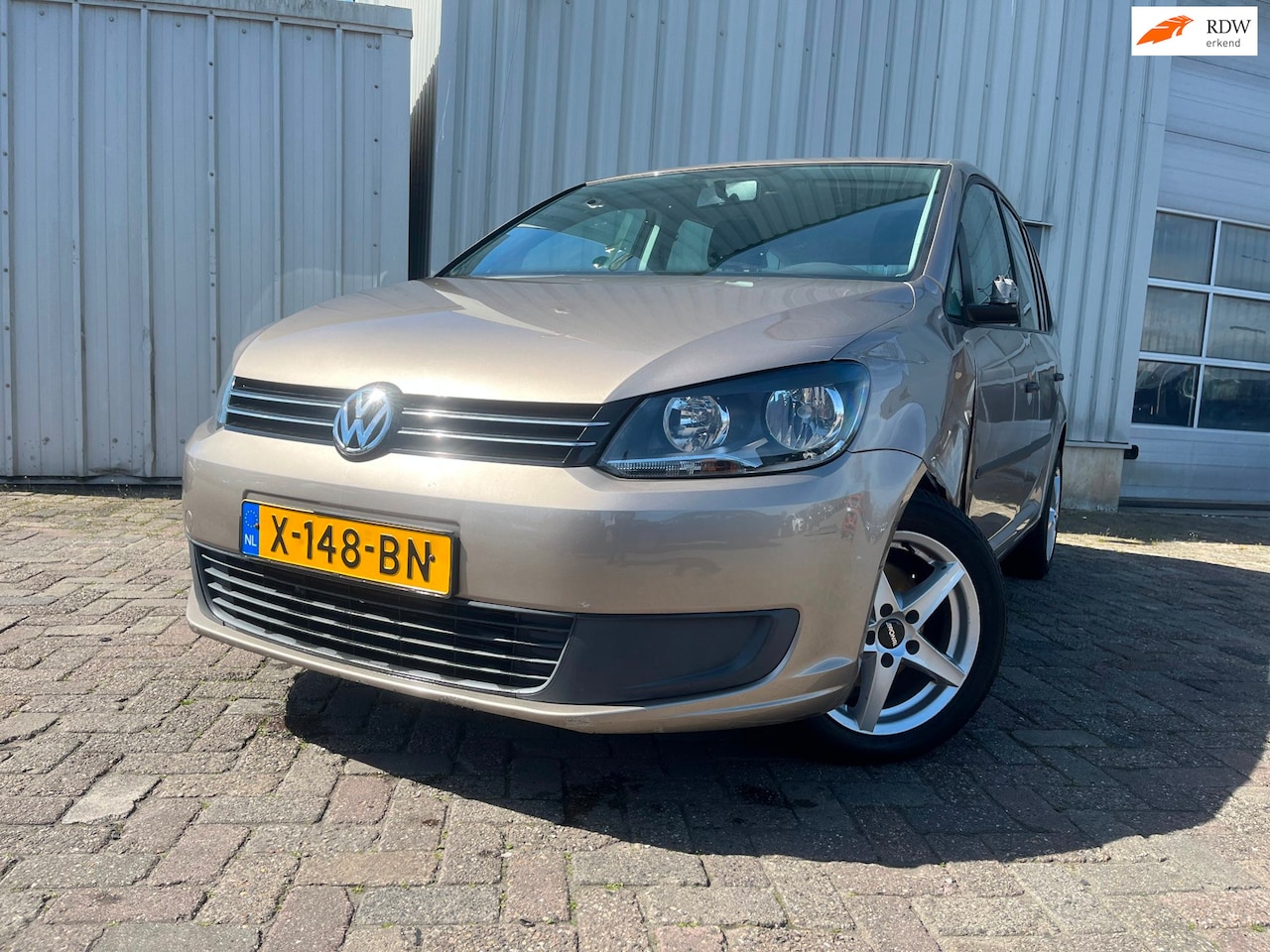 Volkswagen Touran - 1.2 TSI Highline BlueMotion - Schade - AutoWereld.nl