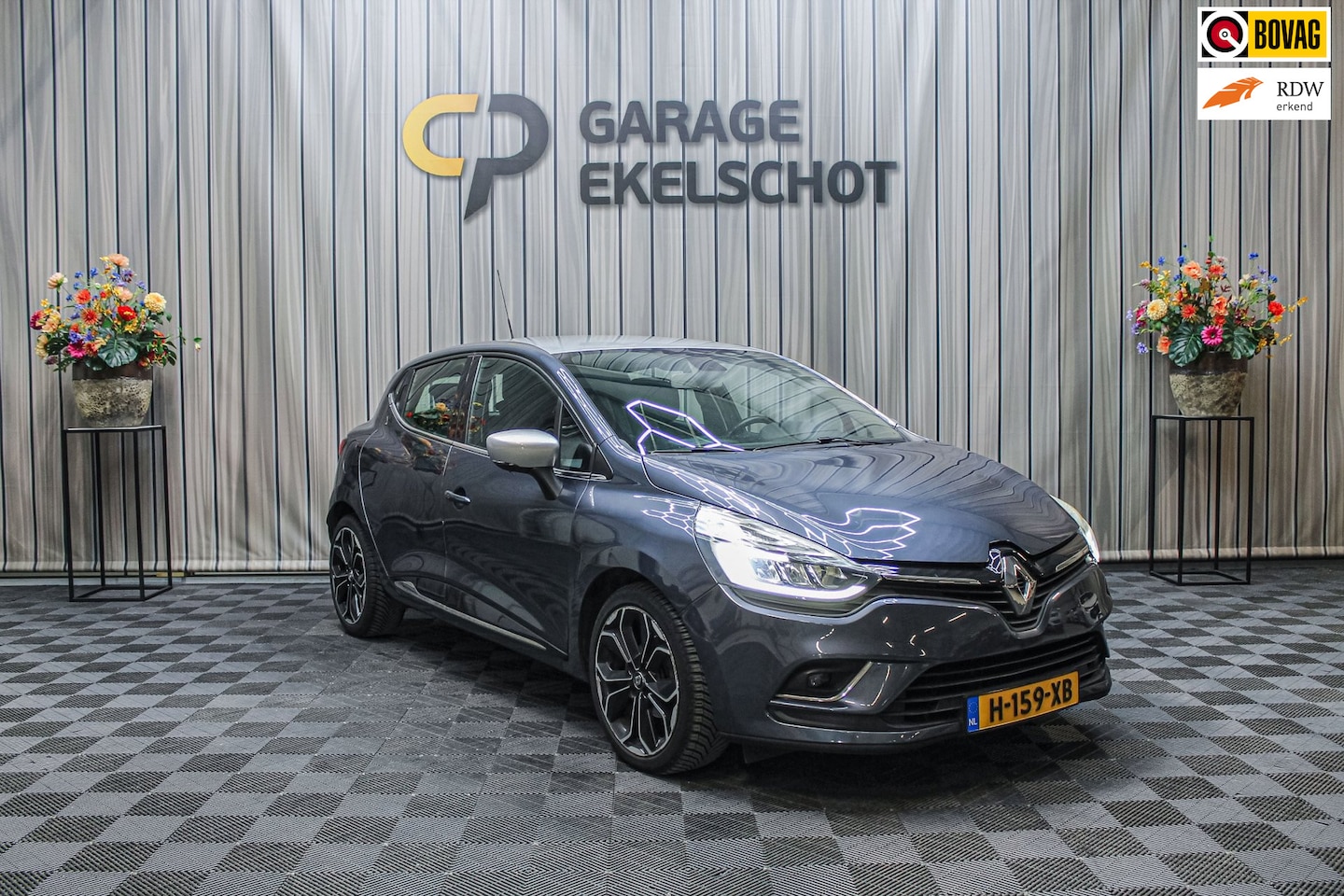 Renault Clio - 1.2 TCe Intens|Aut.|Cruise|Navi|PDC Achter - AutoWereld.nl