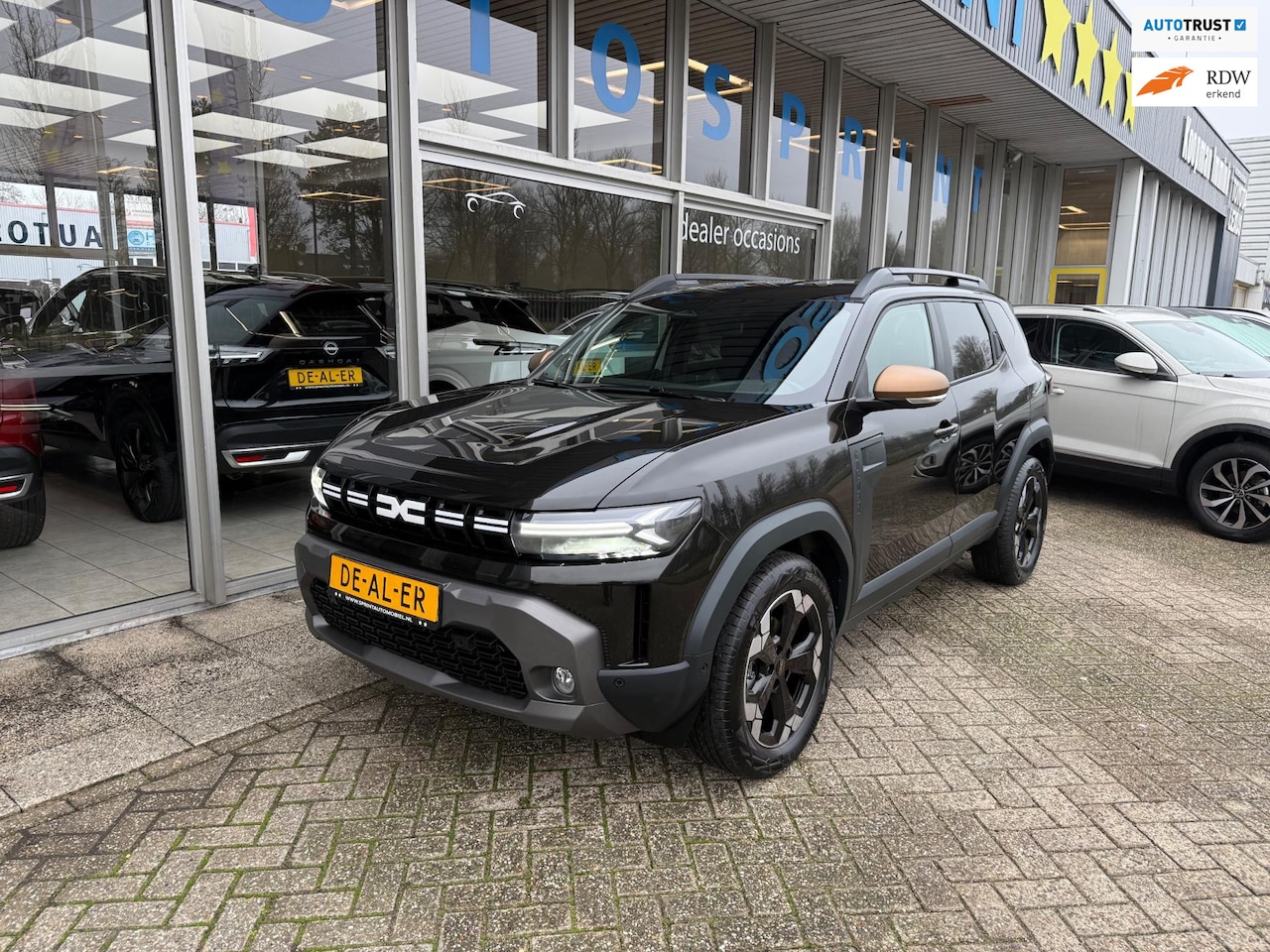 Dacia Duster - 1.6 Hybrid 140 Extreme / ACHTERUITRIJCAMERA / CARPLAY - AutoWereld.nl