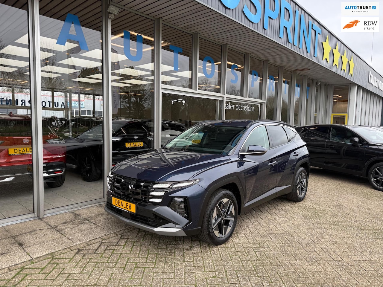 Hyundai Tucson - 1.6 T-GDI MHEV Comfort 161PK / NAVIGATIE / ELEKTRISCHE ACHTERKLEP / - AutoWereld.nl