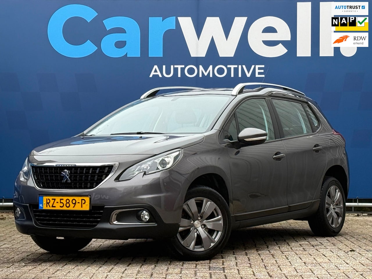 Peugeot 2008 - 1.2 PureTech Blue Lion DistrbutieVV,Navi,Pano,Airco,Carplay,Cruise,PDC,N.A.P!Apk tot 19-12 - AutoWereld.nl