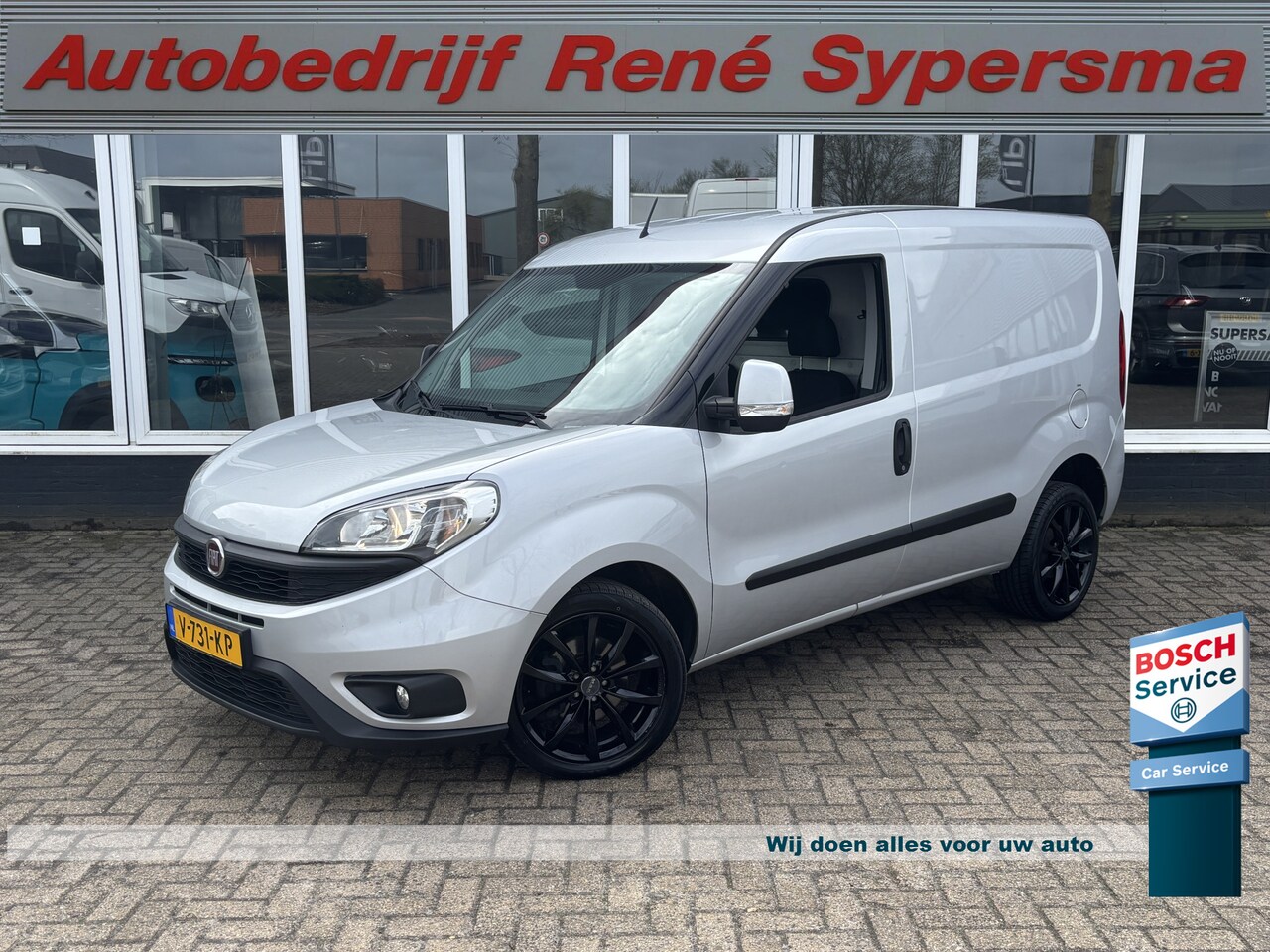 Fiat Doblò Cargo - 1.3 MJ L1H1 | Trehaak | Airco | Navi | Cruise | Parkeersensoren - AutoWereld.nl