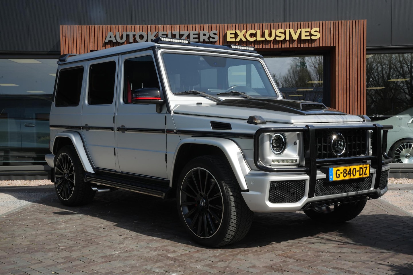 Mercedes-Benz G-klasse - AMG 63 Brabus Look Schuifdak Designo Stoelvent. Sterrenhemel G63 AMG 7 persoons - AutoWereld.nl