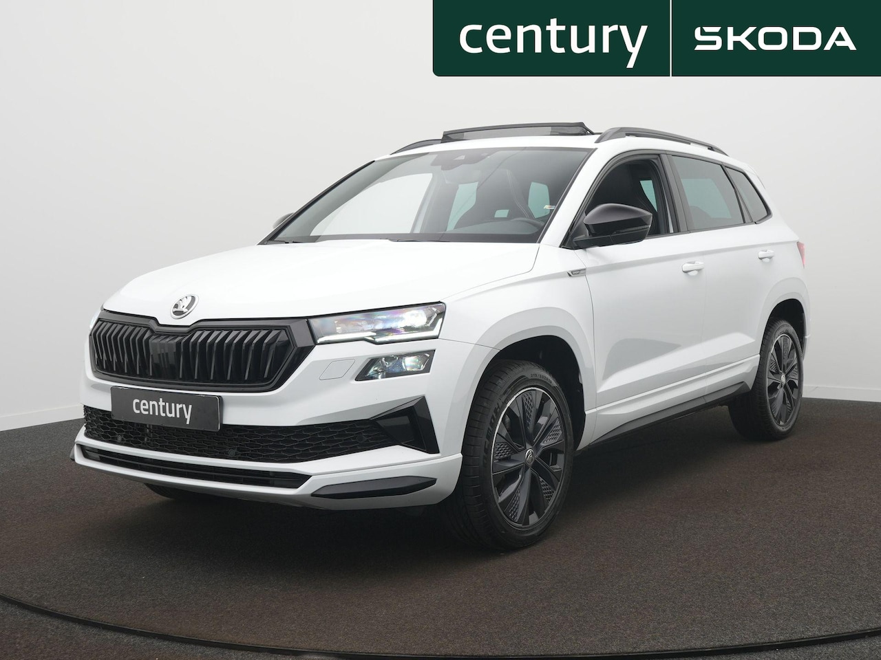 Skoda Karoq - 1.5 TSI ACT Sportline Business DSG / Panodak / Camera / Elek. Klep - AutoWereld.nl