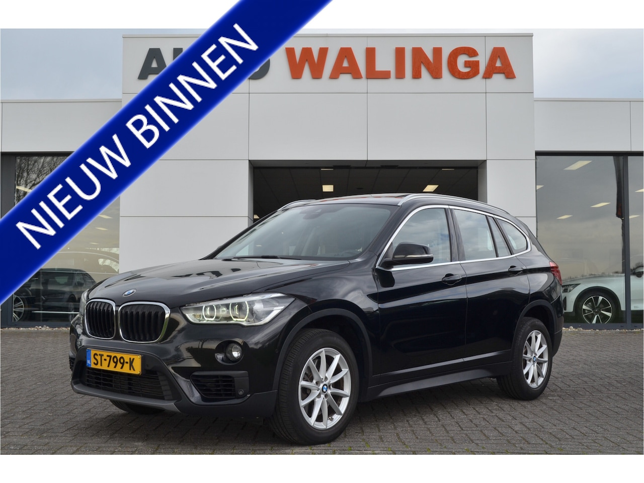 BMW X1 - sDrive20i High Executive | Panoramadak | Leer | Stuur en stoelverw. | Trekhaak 1800kg | He - AutoWereld.nl
