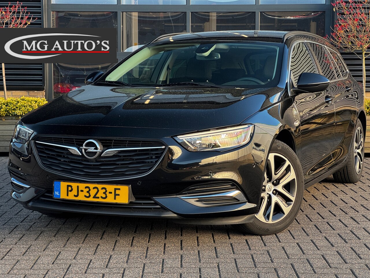 Opel Insignia Sports Tourer - 1.5 Turbo EcoTec Online Edition | Adaptive Cruise Control | Navigatie | Climate Control | - AutoWereld.nl