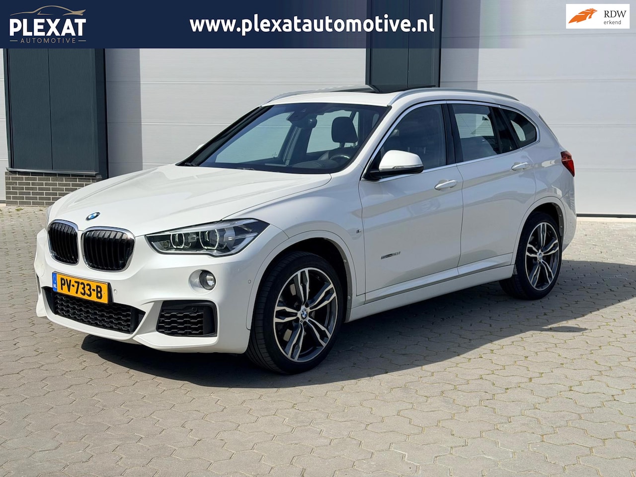 BMW X1 - SDrive20i High Executive Aut. | M-pakket | Stoelverwarming | Head-up | Camera | Trekhaak | - AutoWereld.nl