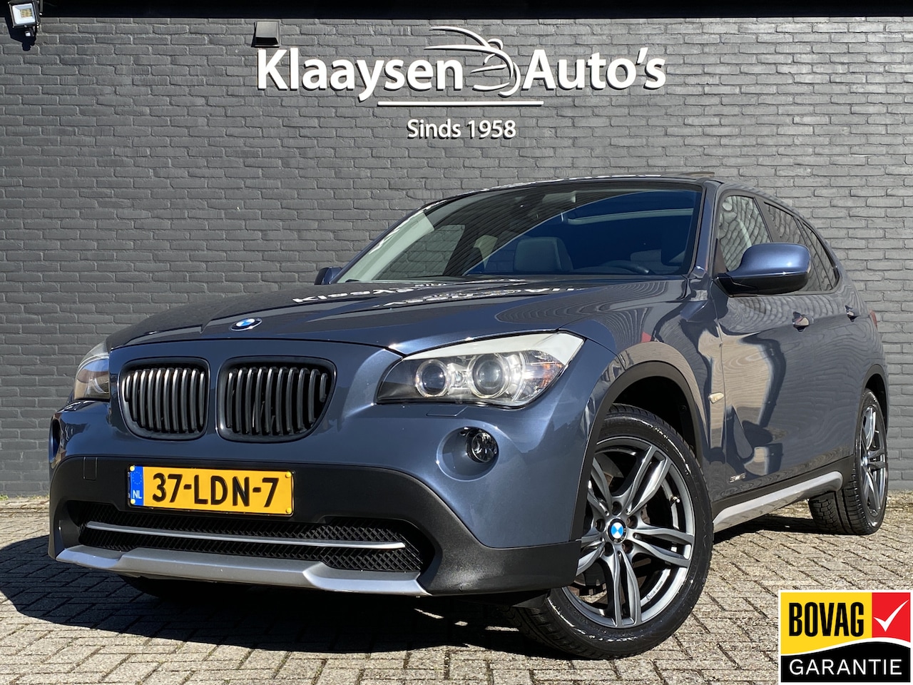 BMW X1 - sDrive18i Executive AUT. | navigatie | panoramadak | sportstoelen | xenon verlichting | li - AutoWereld.nl