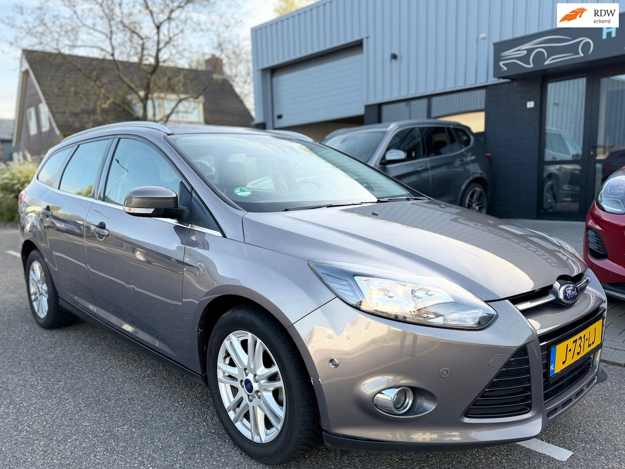 Ford Focus Wagon - 1.0 EcoBoost Titanium I CAMERA I PDC I CLIMA I BLUETOOTH I CRUISECONTROL I AIRCO I NAVI I - AutoWereld.nl