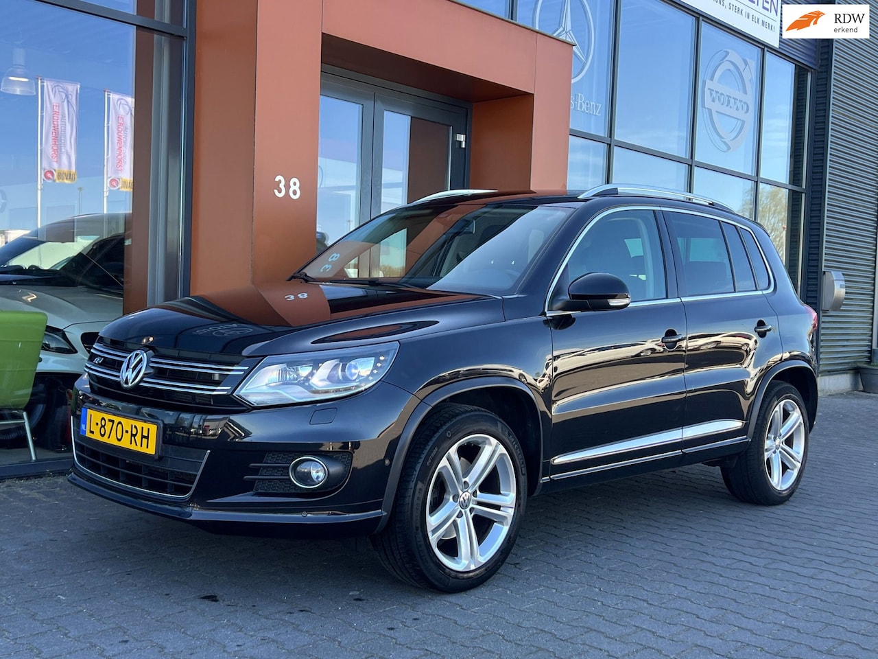Volkswagen Tiguan - 1.4TSI R-design|Xenon|Trekhaak|PDC|Cruise - AutoWereld.nl