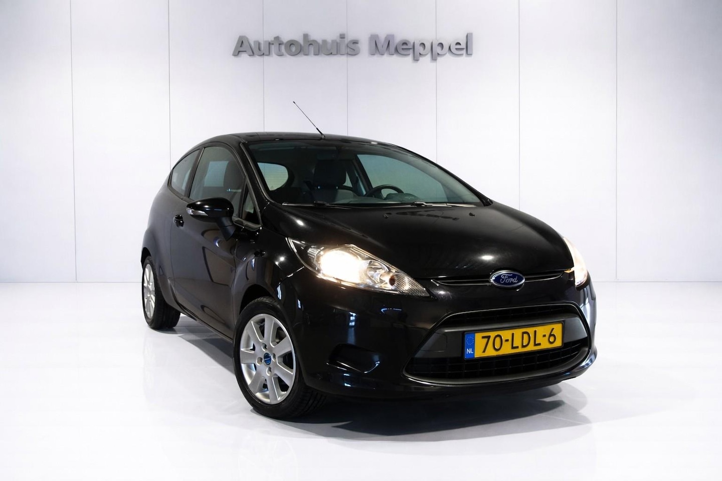 Ford Fiesta - 1.25 Limited | Airco | Extra Winterset - AutoWereld.nl