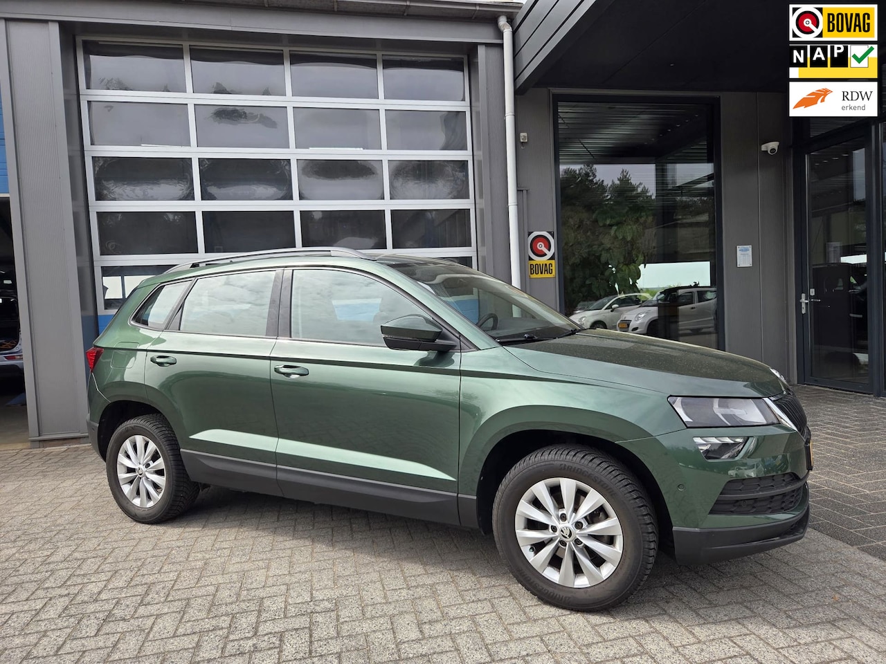 Skoda Karoq - 1.0 TSI Business Edition *Navi/telefoon, * PDC. - AutoWereld.nl