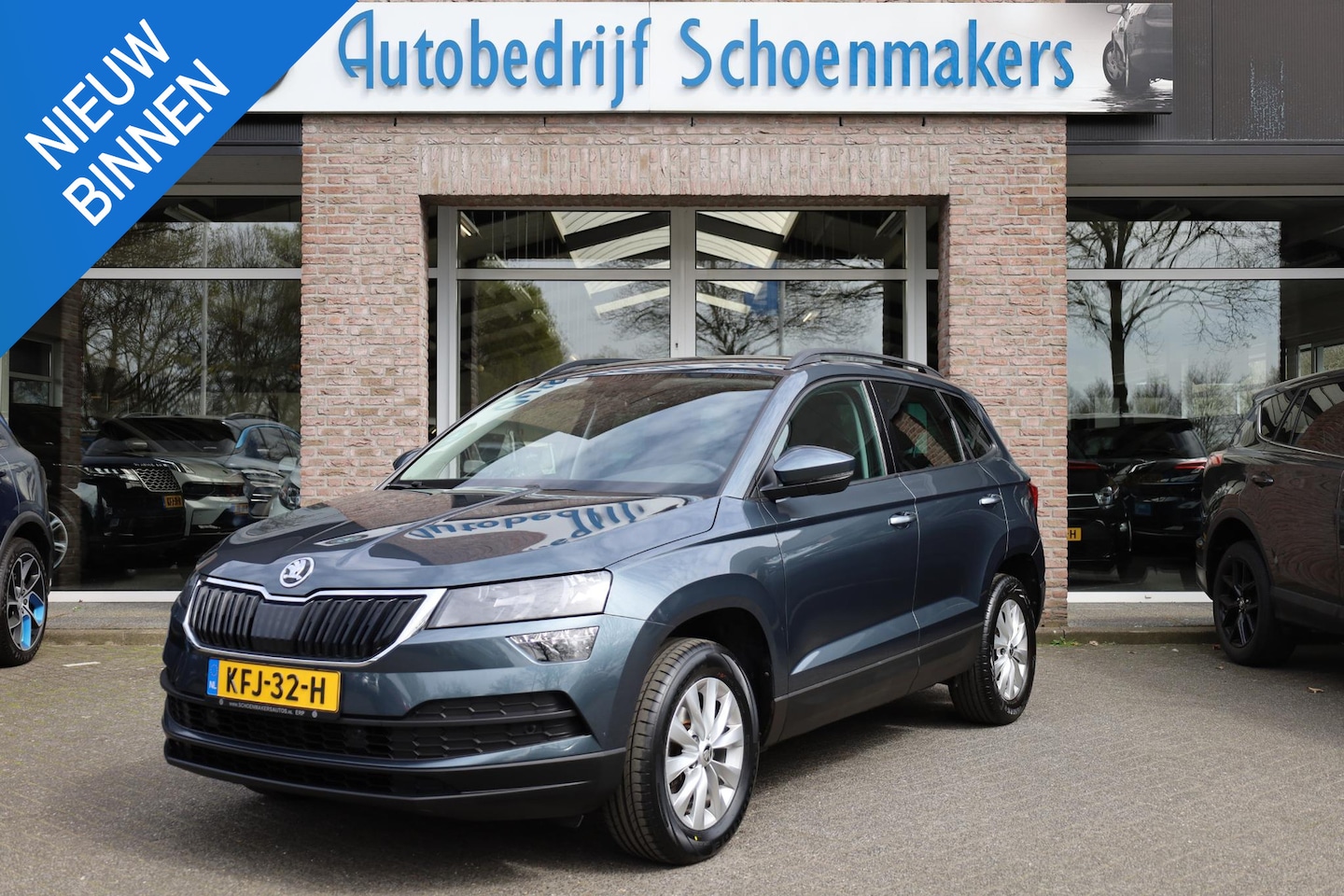 Skoda Karoq - 1.0 TSI Business Edition Plus TREKHAAK-ELEC. CAMERA STOELVERWARMING CARPLAY SFEERVERLICHTI - AutoWereld.nl