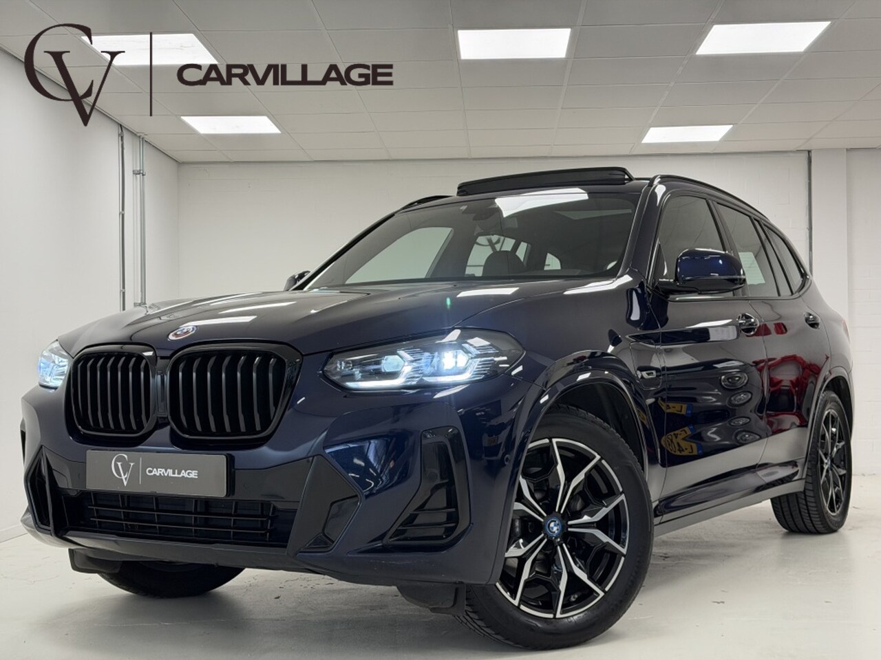 BMW X3 - xDrive30e High M-Sport | Panoramadak | Memory | Tansanitblau | - AutoWereld.nl