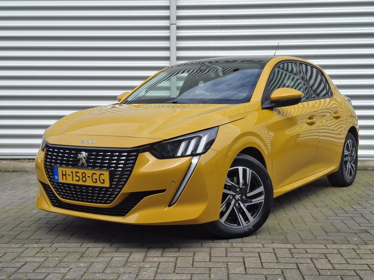 Peugeot 208 - 1.2 100 Allure Pano/Clima/Nav/Cam - AutoWereld.nl