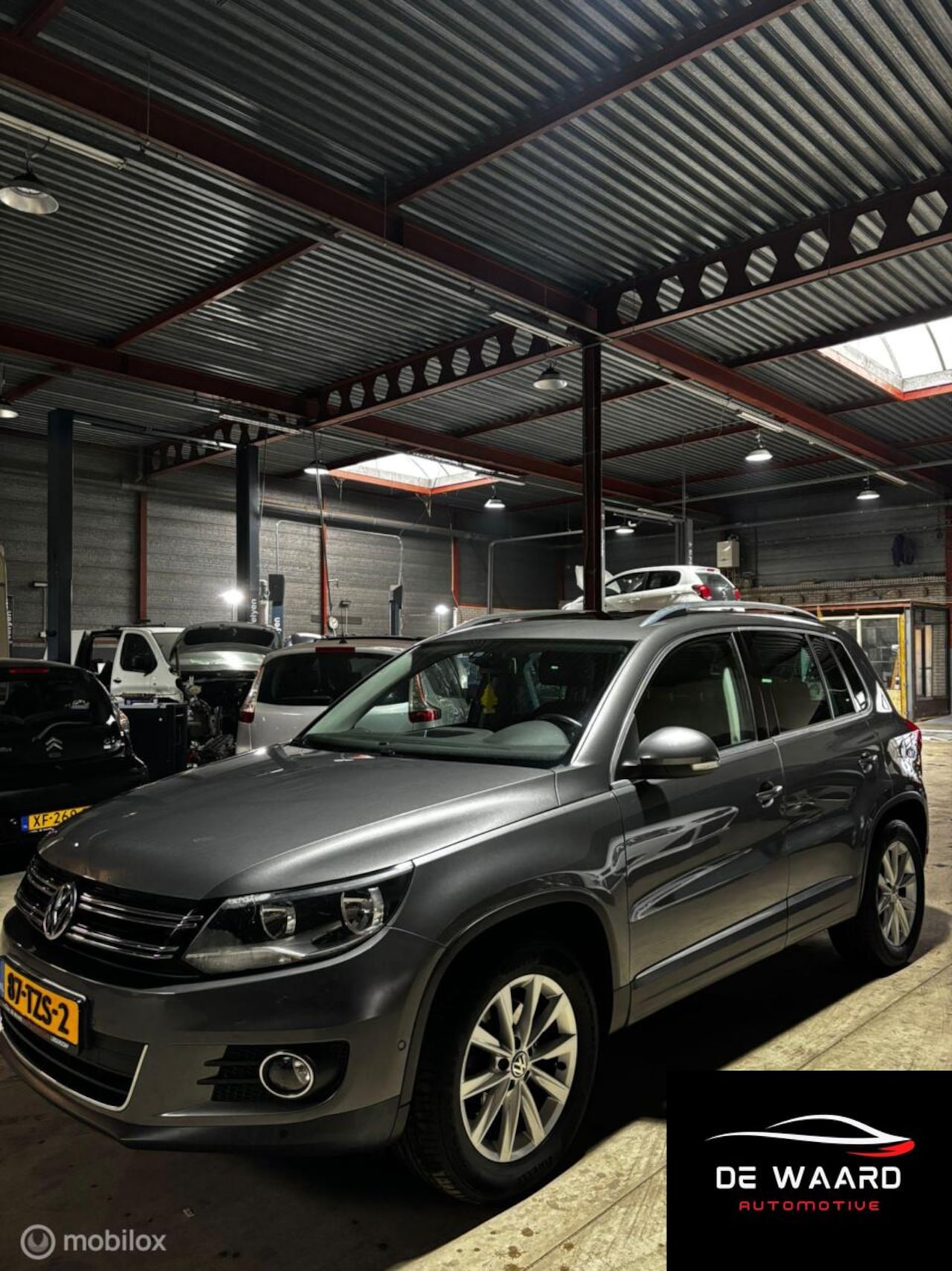 Volkswagen Tiguan - 2.0 TSI Sport&Style 4Motion - AutoWereld.nl