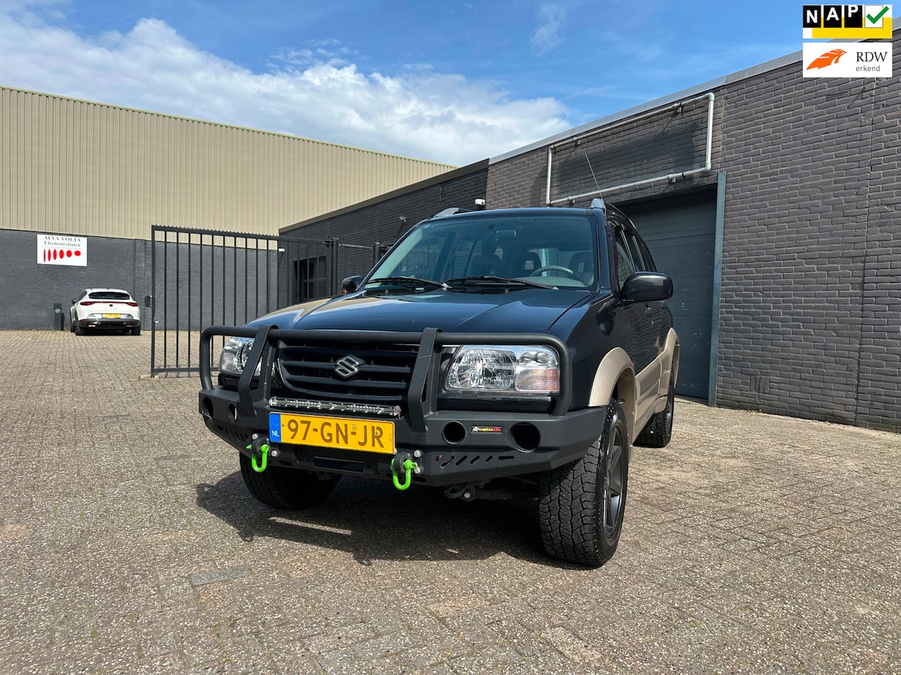 Suzuki Grand Vitara - 2.0 ABS Airbags Airco 4X4 Elek. Pakket LM-Wielen APK NAP - AutoWereld.nl
