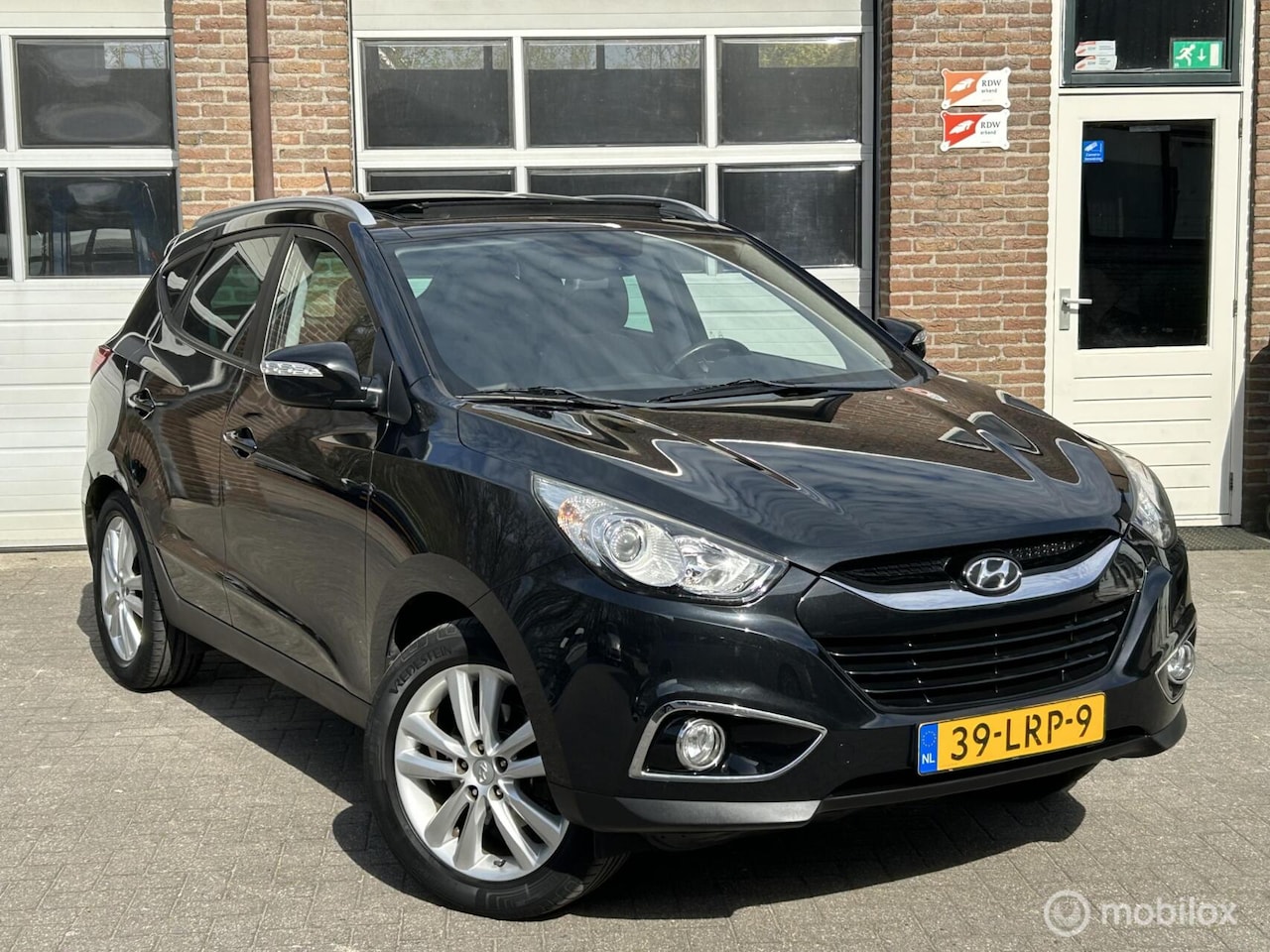 Hyundai ix35 - 2.0i i-Catcher | Clima | Cruise | Trekhaak | - AutoWereld.nl