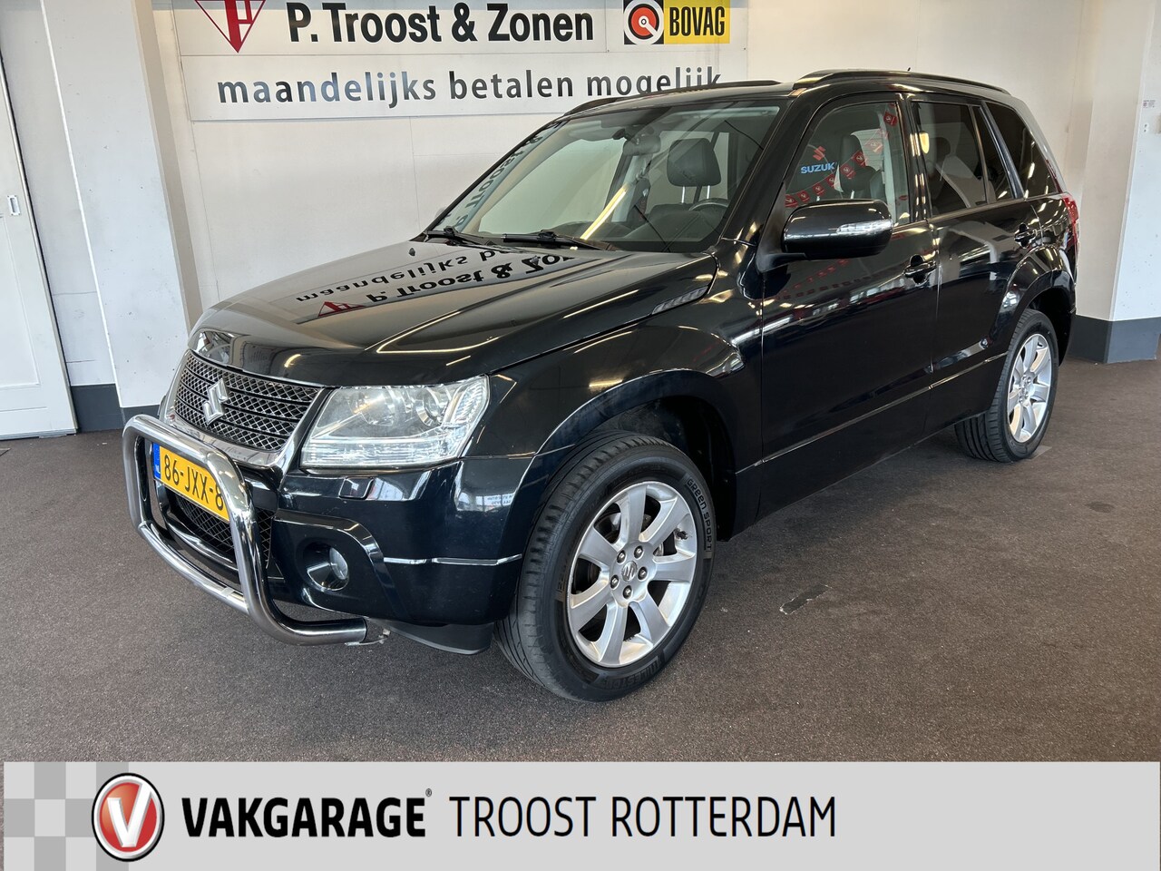 Suzuki Grand Vitara - 2.4 High Executive | Trekhaak | Panoramadak | Lederen bekleding | Climate control | Stoelv - AutoWereld.nl