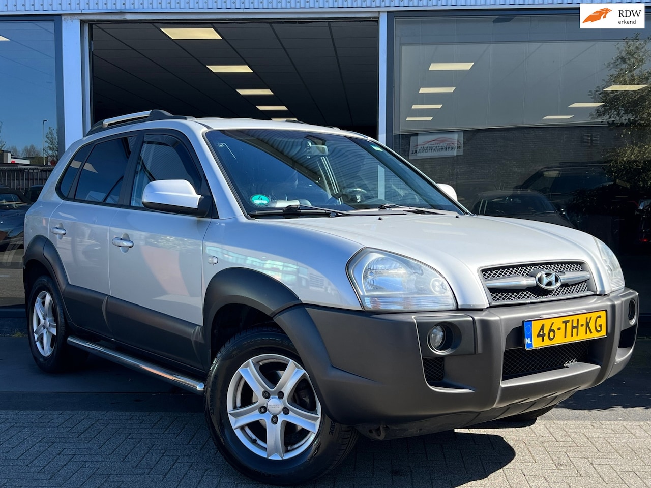 Hyundai Tucson - 2.0i Style Premium CRUISE CONTROL/LEDEREN BEKLEDING/AIRCO/PDC/ELEKTRISCH PAKKET/ - AutoWereld.nl
