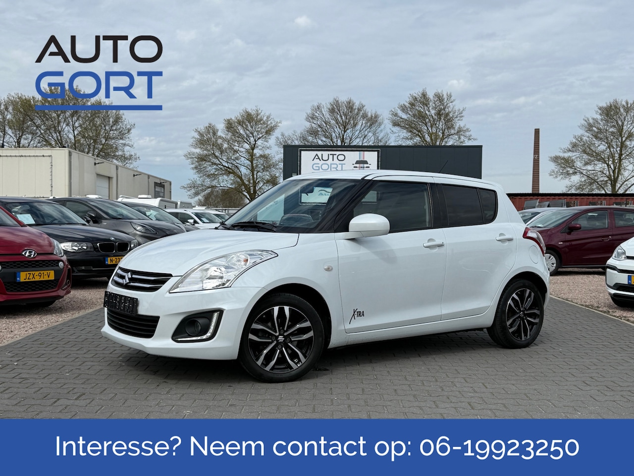 Suzuki Swift - 1.2 X-Tra EASSS | 5 Deurs | Cruise control | Alu velgen | Airco | Metallic Wit - AutoWereld.nl