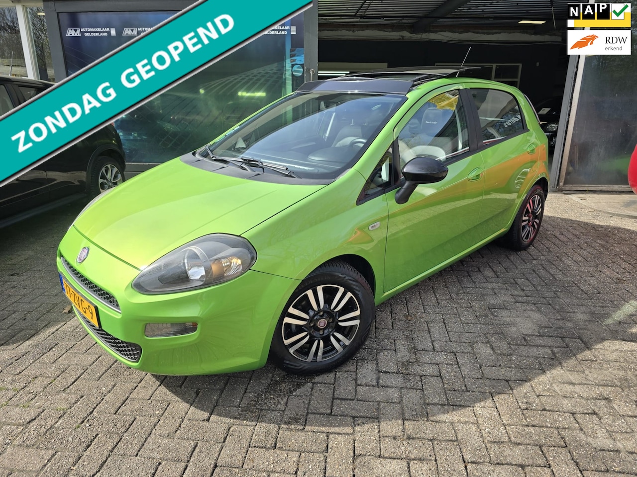 Fiat Punto Evo - 0.9 TwinAir Lounge | 12MND GARANTIE | AIRCO | PANO DAK | NW APK - AutoWereld.nl