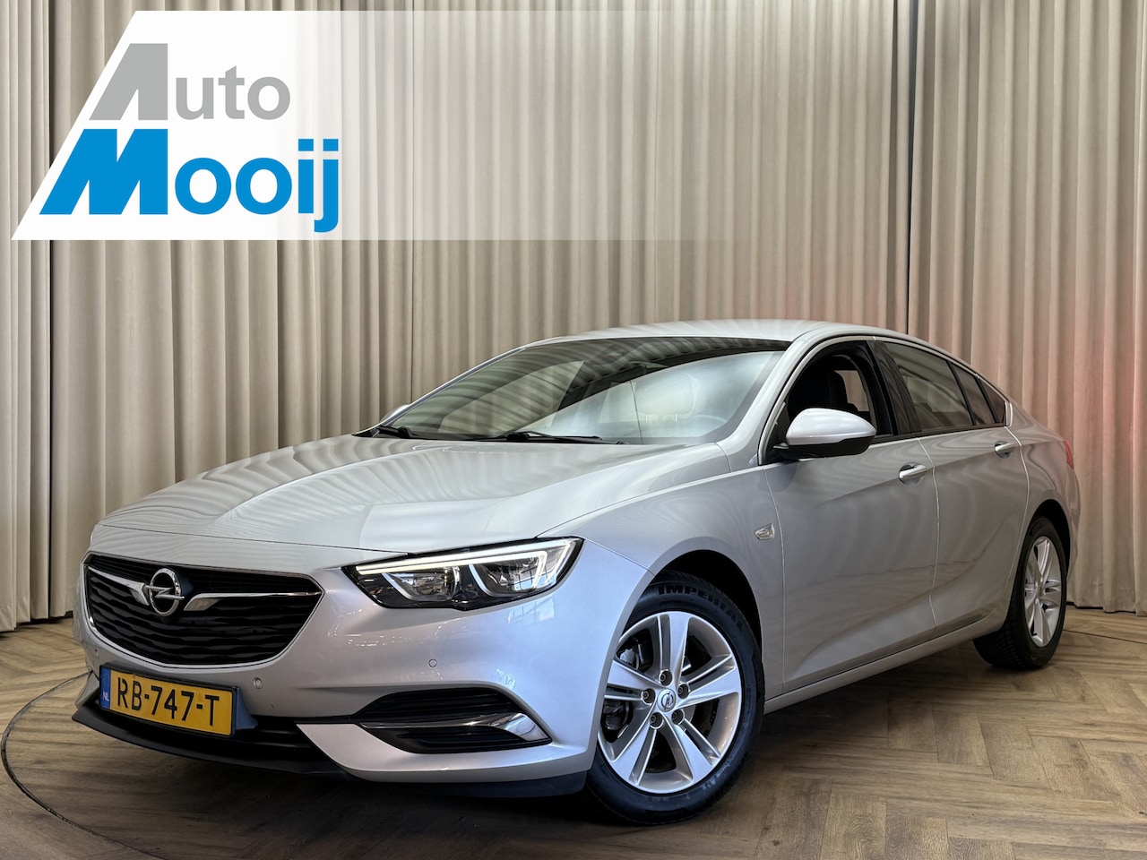 Opel Insignia Grand Sport - 1.5 Turbo Org.NL! / Carplay / 1/2 Leder / Keyless / Navigatie / Cruise / ECC Clima / 17'' - AutoWereld.nl