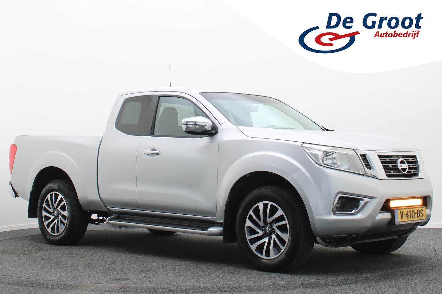 Nissan Navara - 2.3 dCi N-Connecta King Cab AWD Marge, Cruise, Keyless, Airco, Trekhaak, 18" - AutoWereld.nl