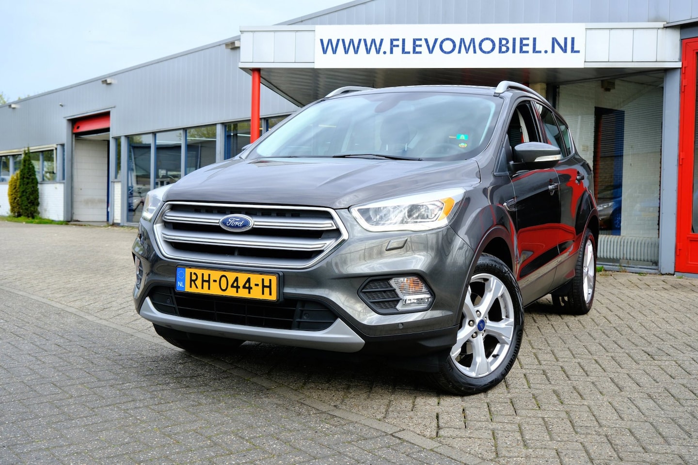 Ford Kuga - 1.5 150pk EcoBoost Titanium Xenon|Navi|Half Leder|1e Eig|ParkAssist|LMV - AutoWereld.nl