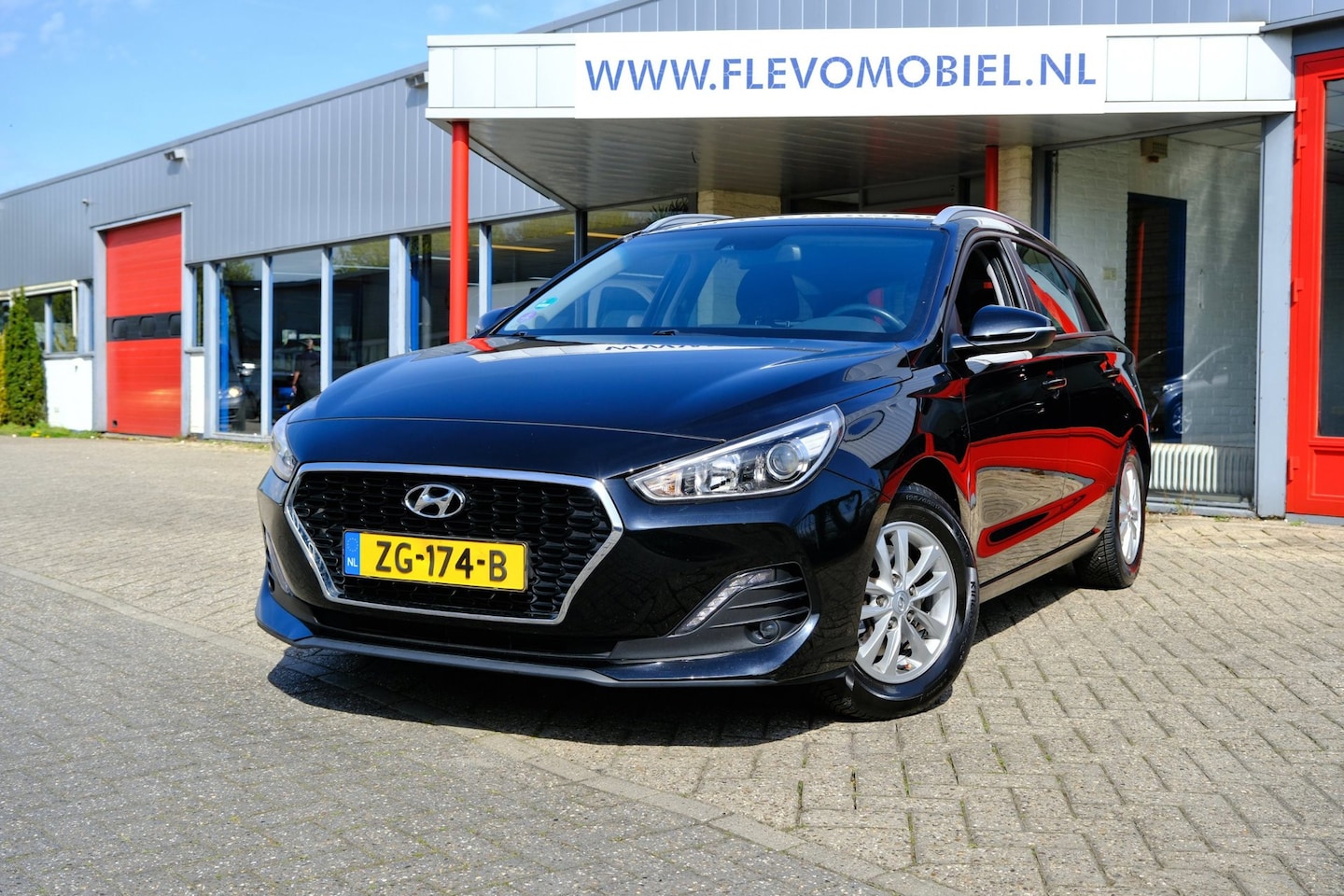 Hyundai i30 Wagon - 1.4 T-GDI Comfort Navi|Clima|Carplay|DAB|Trekhaak - AutoWereld.nl