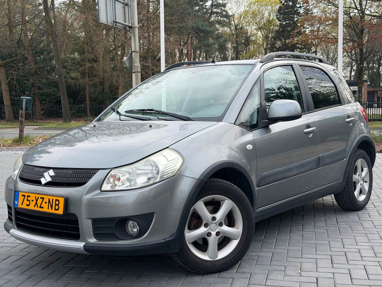 Suzuki SX4 - 1.6 4Grip Exclusive/Airco/LMV/4x4 - AutoWereld.nl