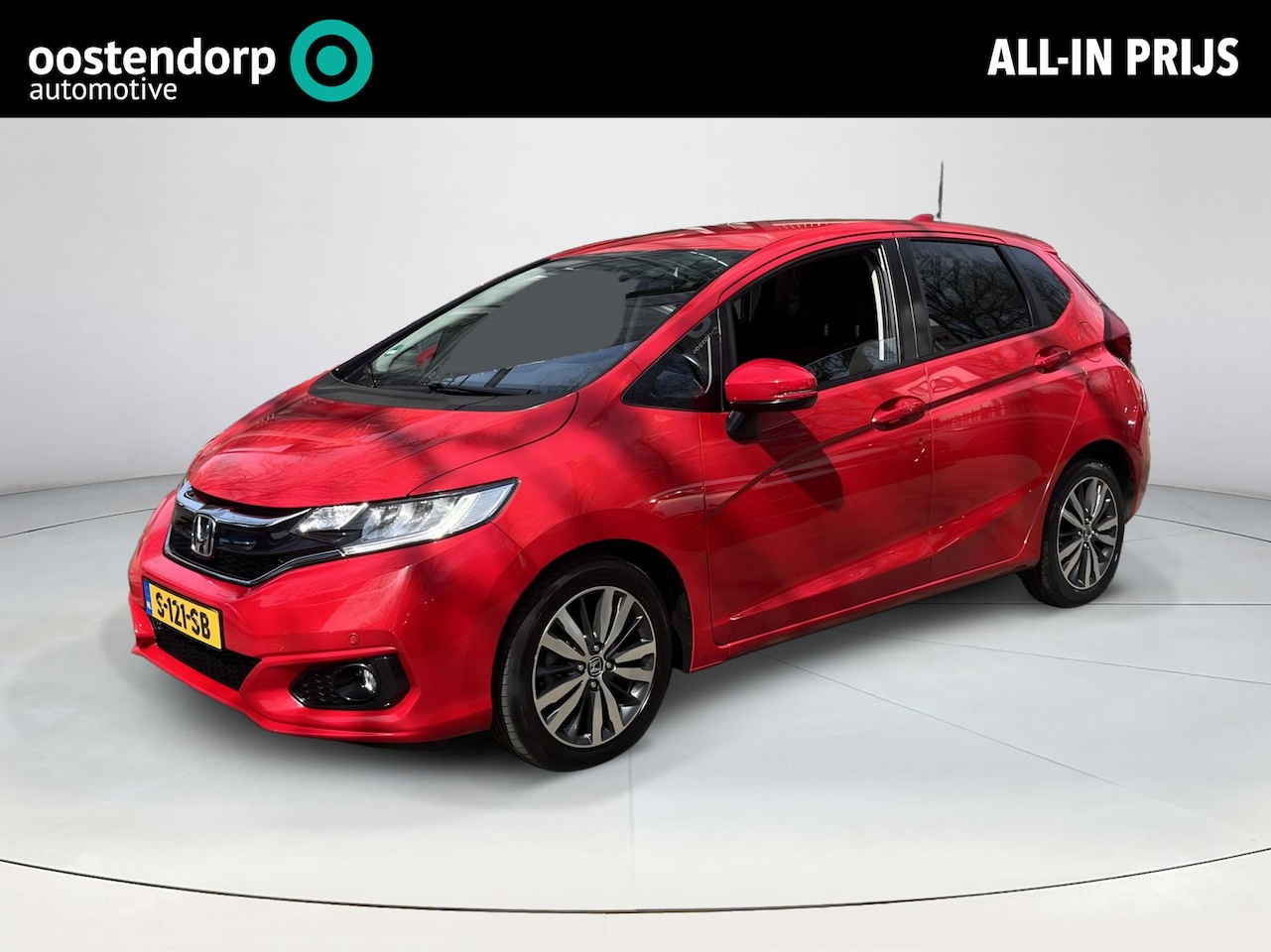 Honda Jazz - 1.3 i-VTEC Comfort rood - AutoWereld.nl