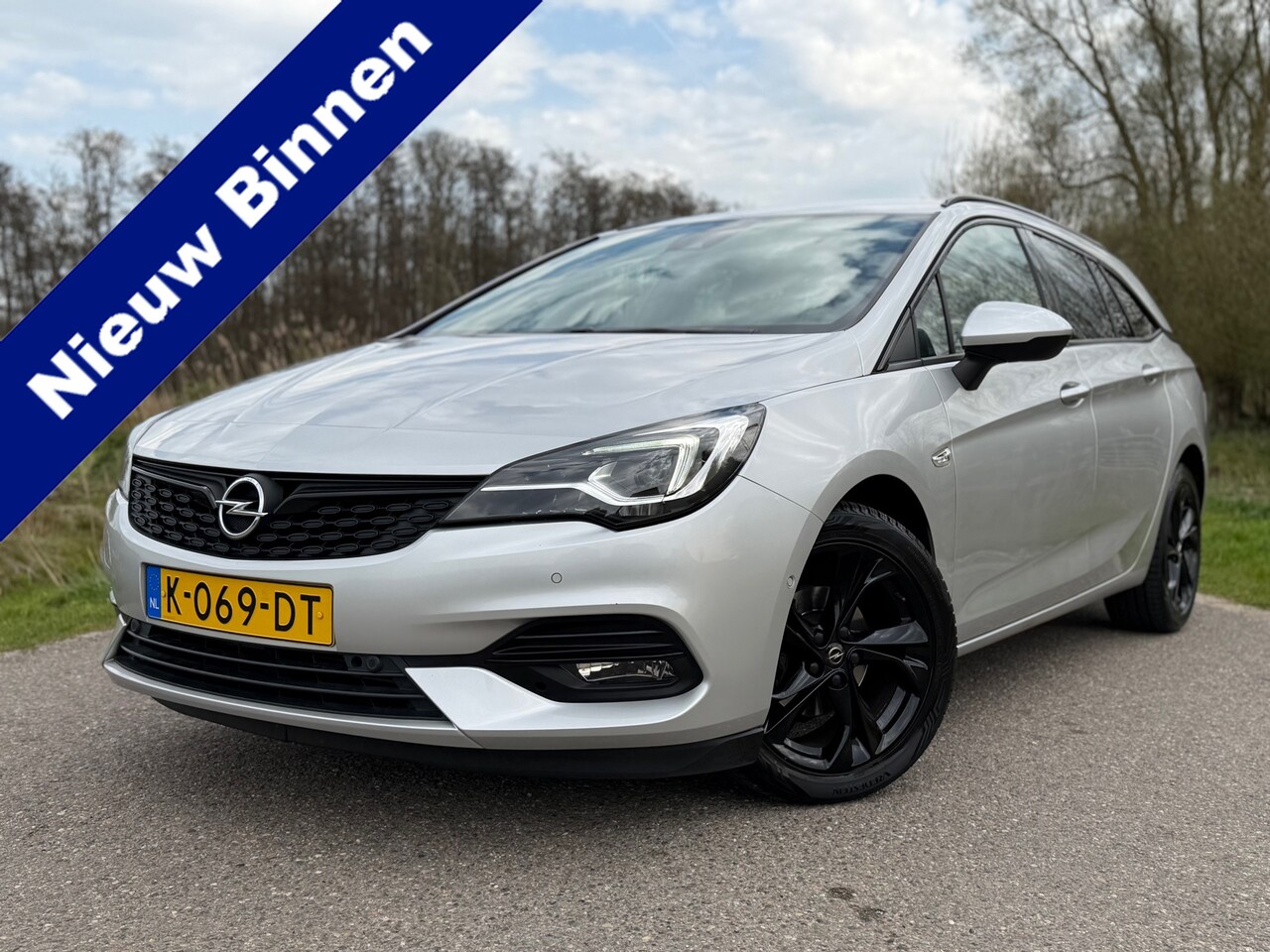 Opel Astra Sports Tourer - 1.2 Ultimate / 1ste Eigenaar / Navigatie / Achteruit camera / Stoel en Stuur-verwarming / - AutoWereld.nl