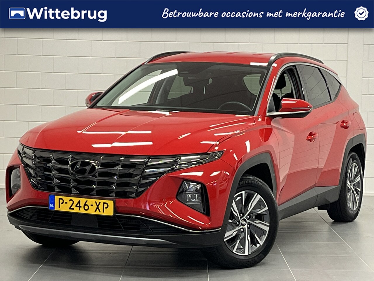 Hyundai Tucson - 1.6 T-GDI HEV Comfort Smart TREKHAAK | AUTOMATISCHE ACHTERKLEP | NAVIGATIE | KEURIGE AUTO! - AutoWereld.nl