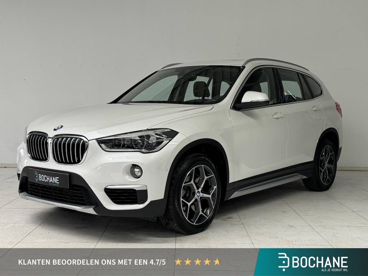 BMW X1 - sDrive20i High Executive | Trekhaak | Leder | Panoramadak | Achteruitrijcamera | - AutoWereld.nl