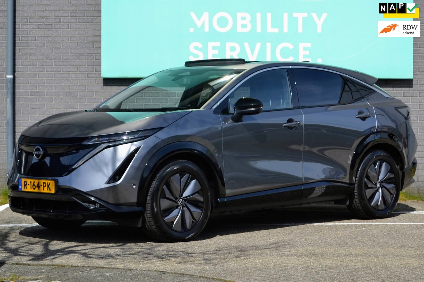 Nissan Ariya - Evolve 91 kWh SOH98% Wpomp CarPlay Pano Leder LED CAM - AutoWereld.nl