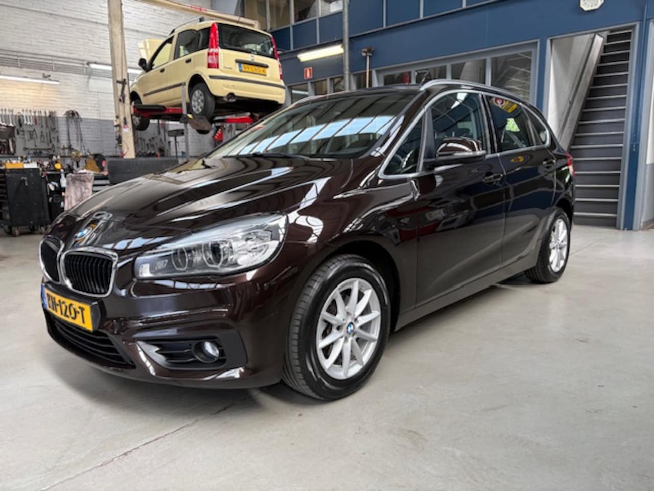 BMW 2-serie Active Tourer - Tour. 216i 102pk Centennial Executive | Navigatie | Climate control | Pdc | Cruise control - AutoWereld.nl