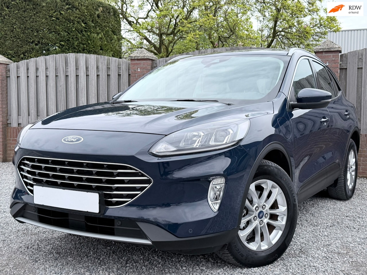 Ford Kuga - 2.5 PHEV Titanium STOELSTUUR VERWARMING P CAMERA INKLAPBARE TREKHAAK P SENSOREN STOELVERWA - AutoWereld.nl