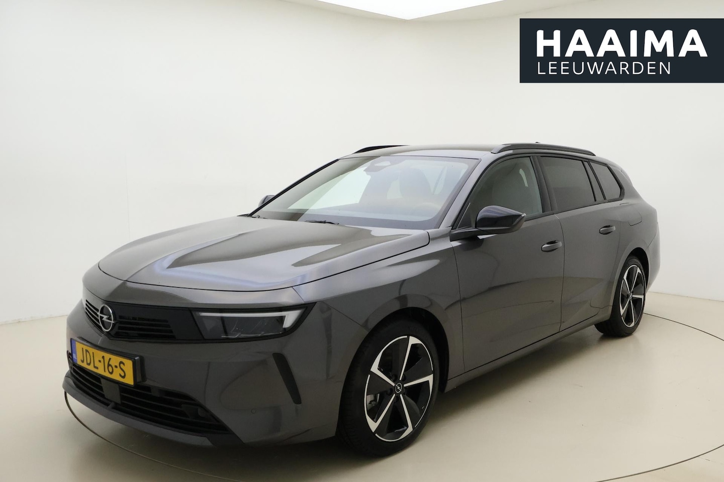 Opel Astra Sports Tourer - 1.6 Turbo Plug In Hybrid Business Edition | Navigatie | Afneembare trekhaak | 7,4 KW lader - AutoWereld.nl