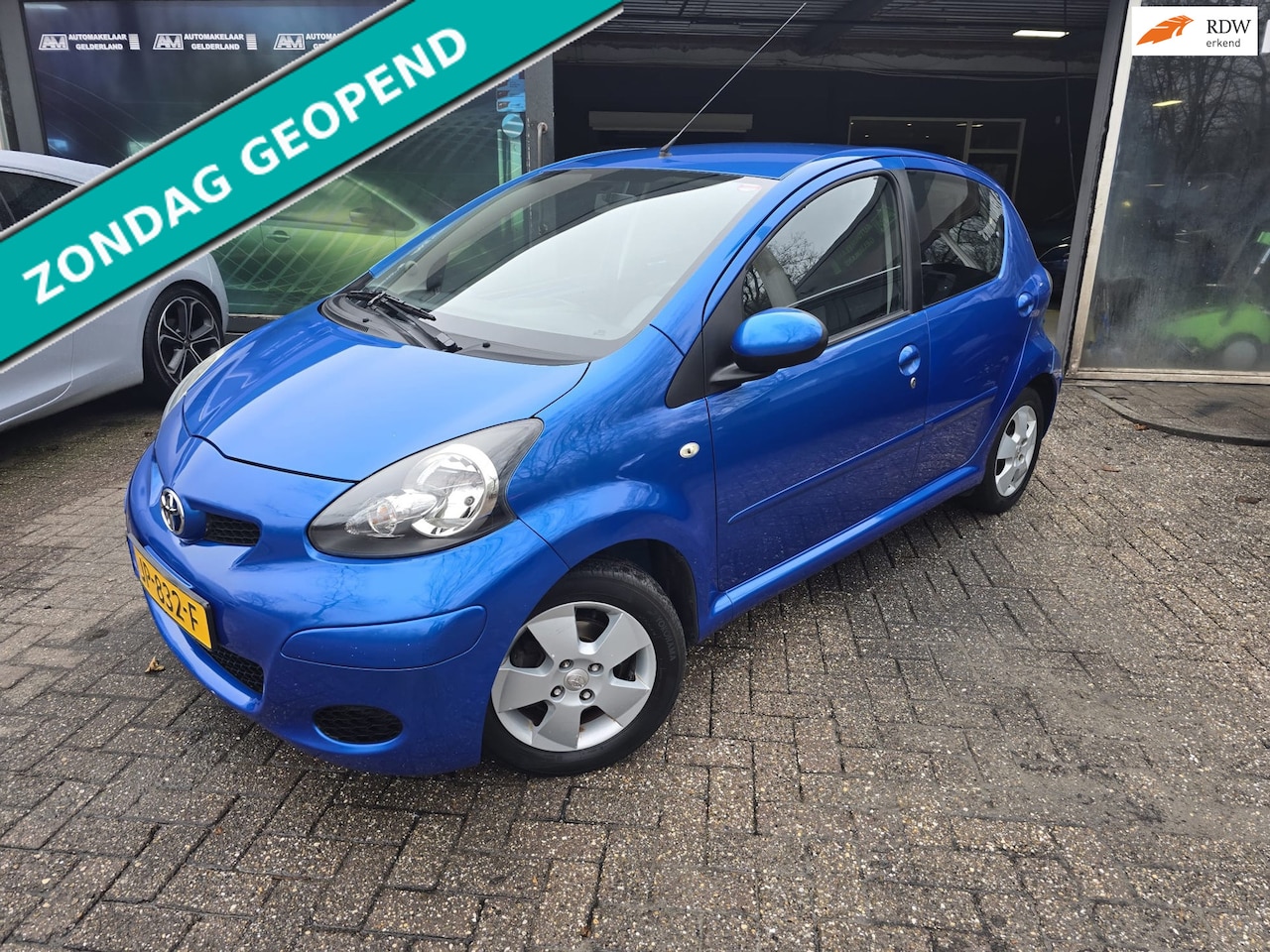 Toyota Aygo - 1.0-12V Dynamic Blue | NW KOPPELING | 12MND GARANTIE | AUTOMAAT | AIRCO | ELEC RAMEN | LMV - AutoWereld.nl