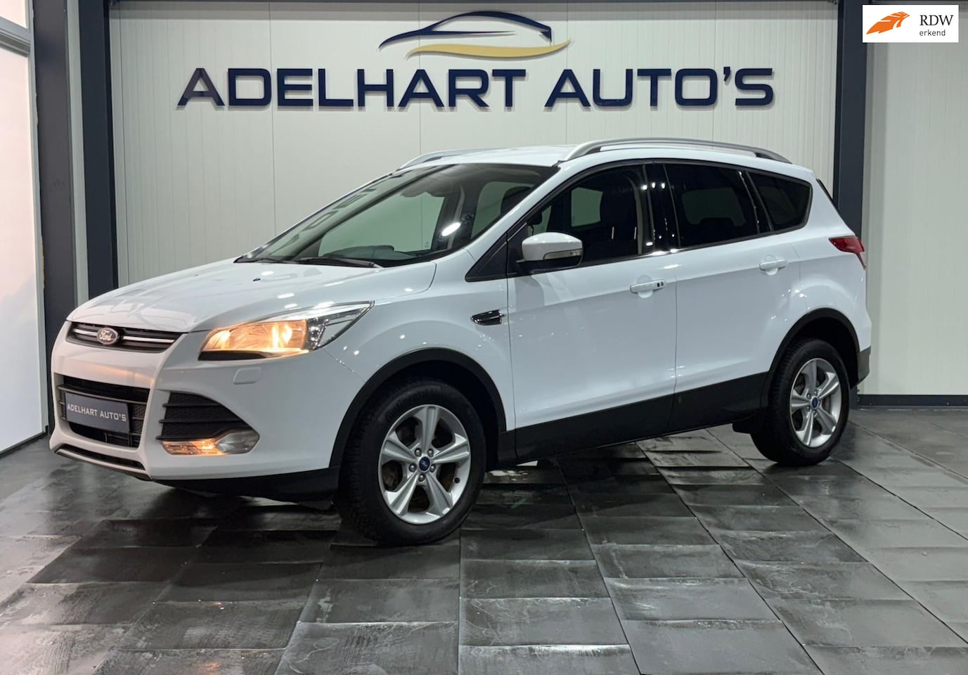 Ford Kuga - 1.6 Titanium / Key less / Elektrische koffer / Verwarmde stoelen / Verwarmd stuur - AutoWereld.nl
