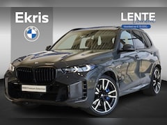 BMW X5 - xDrive50e Launch Edition | M Sportpro | Sky Lounge Panoramadak | Stoelventilatie | Driving