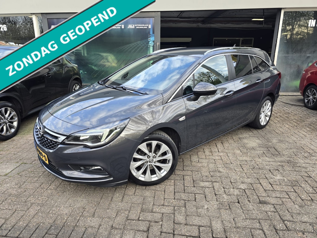 Opel Astra Sports Tourer - 1.4 Edition | 2E EIGENAAR | 12MND GARANTIE | NW KOPPELING | NAVI - AutoWereld.nl