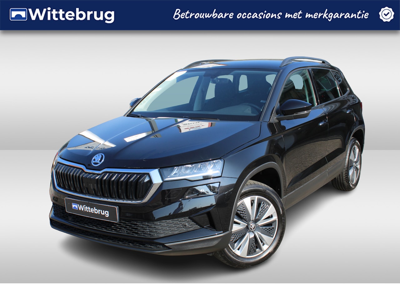Skoda Karoq - 1.0 TSI 110pk Ambition / Navigatie by APP / LM 17 inch / Camera / LED / Parkeersensoren / - AutoWereld.nl