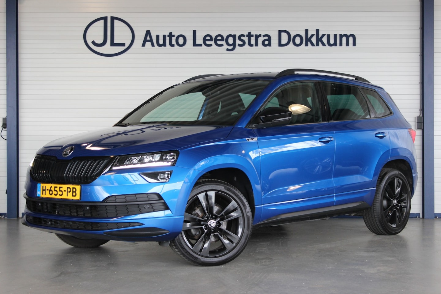 Skoda Karoq - 1.5 TSI ACT Sportline Business 1e eigenaar | Virtual Cockpit | Keyless | Stoelverw. | Carp - AutoWereld.nl