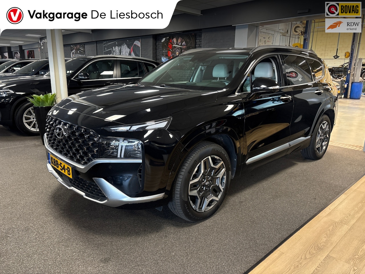 Hyundai Santa Fe - 1.6 T-GDI PHEV 4wd Premium 7p SOH100% /navi / leer / Krell audio / head up / stoel koeling - AutoWereld.nl