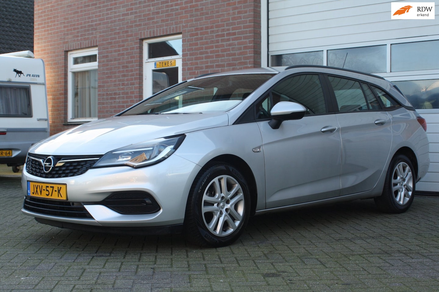 Opel Astra Sports Tourer - 1.4 Business Edition Garantie, Automaat, Station, Elektrische Ramen, Onderhoud Boekje - AutoWereld.nl