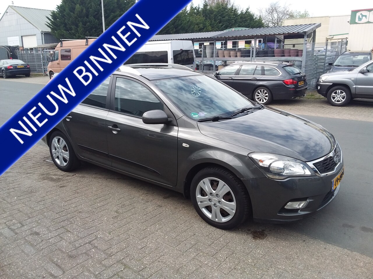 Kia Cee'd - 1.4 CVVT X-ecutive 1.4 CVVT X-ecutive - AutoWereld.nl